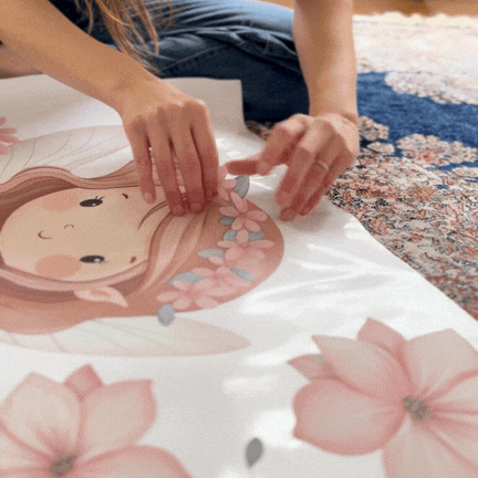 Peeling a fairy wall decal from tiny tale prints