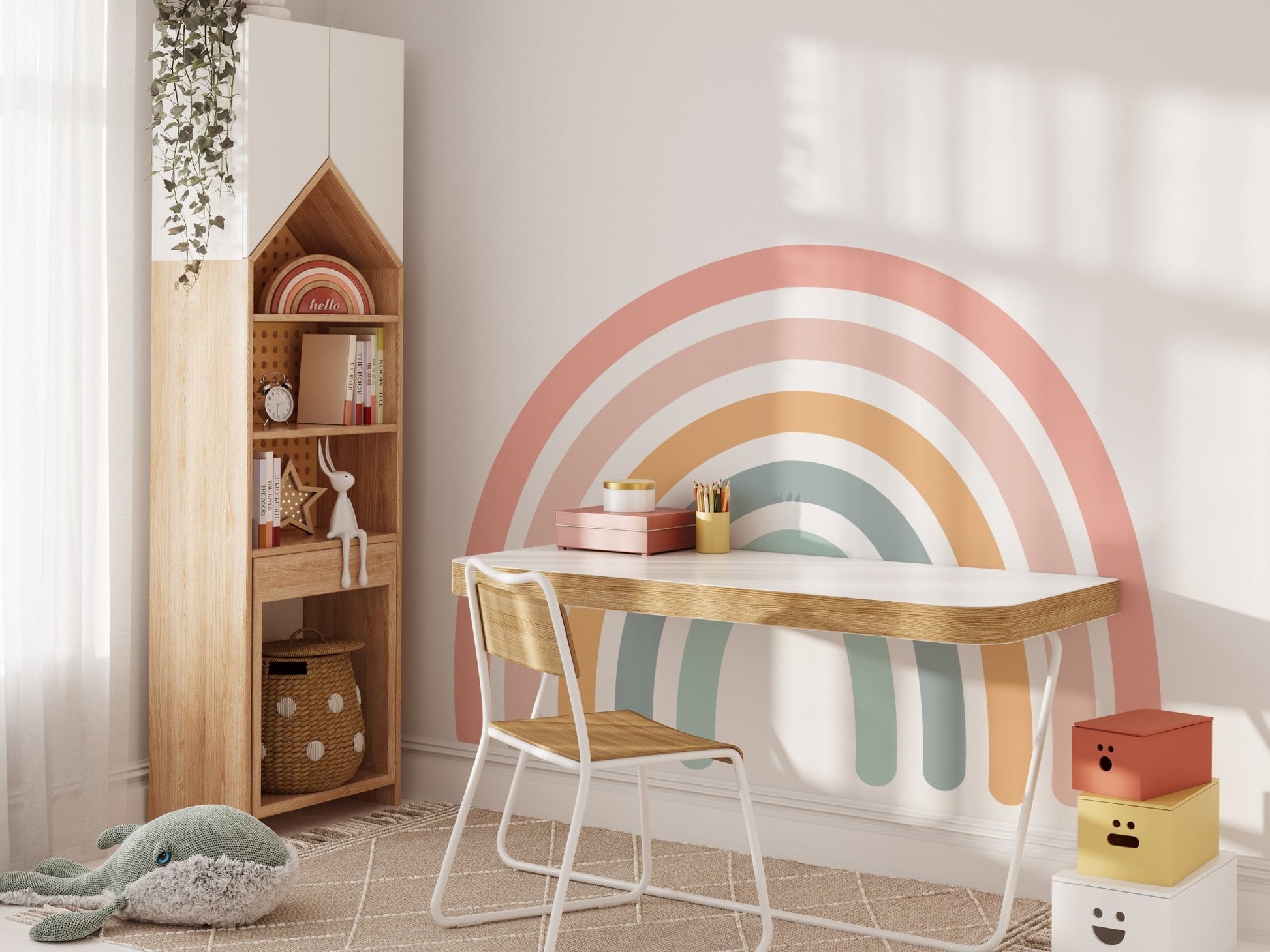 Large pastel rainbow wall decal behind a kids' study desk with wooden bookshelf — Tiny Tale Prints